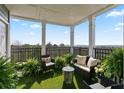 Cozy patio area with comfortable seating, planters, and a lovely view at 4100 Paces Se Walk # 4306, Atlanta, GA 30339