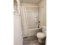 A clean bathroom with a shower, tub, and toilet at 4173 Stillwater Dr, Duluth, GA 30096