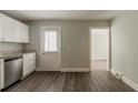 Eat-in kitchen providing stainless appliances and access to another room at 2465 Hogan Rd, Atlanta, GA 30344