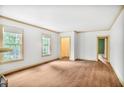 Bright living room with hardwood floors and large windows, offering ample natural light at 1861 Ardmore Nw Rd, Atlanta, GA 30309