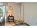 Welcoming foyer with hardwood floors, decorative details, and access to adjacent rooms at 34 Duke Dr, Lawrenceville, GA 30046