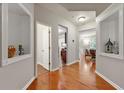 Inviting entryway with hardwood floors and decorative wall niches at 2060 Ellison Nw Way # 11, Kennesaw, GA 30152