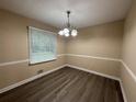 Cozy dining room featuring hardwood floors and neutral paint at 2326 Westland Way, Acworth, GA 30102