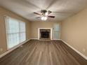 Spacious living room with a fireplace and hardwood floors at 2326 Westland Way, Acworth, GA 30102