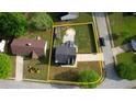Aerial view showcases this homes backyard and its proximity to other homes in the area at 1700 Conductor Ln, Conyers, GA 30013