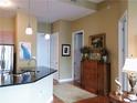 Stylish kitchen featuring a breakfast bar with a black countertop and stainless steel appliances at 711 Cosmopolitan Ne Dr # 123, Atlanta, GA 30324