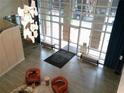 Overhead view of a stylish lobby with large windows and comfortable seating area at 711 Cosmopolitan Ne Dr # 123, Atlanta, GA 30324