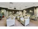Home theater room featuring comfortable seating, a projector, and excellent viewing conditions at 711 Cosmopolitan Ne Dr # 123, Atlanta, GA 30324