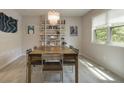 Bright dining room with hardwood floors, decorative chandelier, and an abundance of natural light at 4274 Revere Cir, Marietta, GA 30062