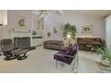 Bright living room with vaulted ceiling, fireplace, comfortable seating, and elegant decor at 4274 Revere Cir, Marietta, GA 30062