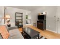 Comfortable living room with sleek furniture arrangement and plenty of natural light at 148 Waverly Way # 10, Atlanta, GA 30307