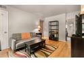 Cozy living room features hardwood floors and neutral walls that enhance the bright atmosphere at 148 Waverly Way # 10, Atlanta, GA 30307