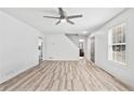 A spacious room featuring new floors, fresh paint, and natural light creating an inviting atmosphere at 3362 Alexis Ct, Marietta, GA 30066