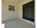 Covered entryway featuring a set of double doors that lead into the home at 1987 Darrell Dr, Marietta, GA 30066