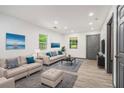 Comfortable living room with neutral tones and plenty of natural light at 1477 Olive Sw St, Atlanta, GA 30310