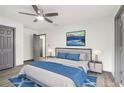 Spacious main bedroom with a ceiling fan and ensuite bathroom at 1477 Olive Sw St, Atlanta, GA 30310