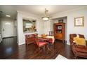 Cozy dining area featuring hardwood floors and a view into the kitchen at 1261 Lavista Rd # N4, Atlanta, GA 30324