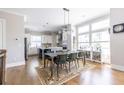 Inviting living space showcasing a dining area and seamless transition into the modern kitchen at 834 S Columbia Dr, Decatur, GA 30030