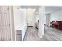 Bright entryway with hardwood floors and view to formal room at 2203 Beacon Crest Dr, Buford, GA 30519