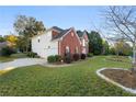 A beautiful two-story home featuring a side-entry garage and lush landscaping at 10 Bunker Lane St, Covington, GA 30014