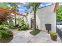 Charming exterior with lush landscaping, mature trees, and a welcoming entrance at 830 Dekalb Ave # 1, Atlanta, GA 30307