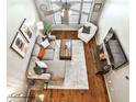 Aerial view of stylish living room with contemporary furnishings and decor at 955 Juniper Ne St # 2322, Atlanta, GA 30309
