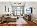 Living room showcasing hardwood floors, high ceilings, and modern decor at 955 Juniper Ne St # 2322, Atlanta, GA 30309