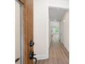 Open entryway showcasing hardwood floors and a view into the bright and airy living space at 110 Doris Path, Dallas, GA 30157