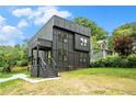 Contemporary two-story home with striking curb appeal and landscaped front yard at 3139 Alston Dr, Decatur, GA 30032