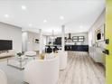 Bright and airy living room with modern furniture and an open-concept kitchen at 3139 Alston Dr, Decatur, GA 30032