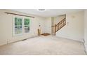 Inviting living room featuring stairs to the upper floor at 187 Timber Creek Sw Ln, Marietta, GA 30060