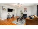 Bright living room with hardwood floors, modern furnishings, and ample natural light at 1418 Foxhall Se Ln # 18, Atlanta, GA 30316