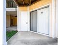 A small patio with sliding glass doors offers an outdoor living space at 414 Ridge Creek Dr, Clarkston, GA 30021