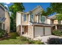 Attractive two-story home with stone accents and an attached two-car garage at 2034 Reavis Blf, Conyers, GA 30012