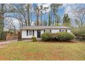 Charming single-story home with well-kept lawn, mature trees and traditional curb appeal at 430 Argus Nw Cir, Atlanta, GA 30331