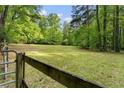 Expansive grassy land perfect for outdoor activities or potential development at 601 Ashley Forest Nw Dr, Acworth, GA 30102