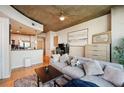 Comfortable living room with open access to a modern kitchen, perfect for entertaining guests at 3324 Peachtree Ne Rd # 1104, Atlanta, GA 30326