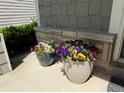 Charming front porch with colorful potted flowers adding curb appeal to the entrance at 269 Privet Cir, Suwanee, GA 30024
