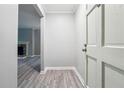Inviting entryway featuring grey vinyl flooring and freshly painted walls at 2930 Parc Lorraine, Lithonia, GA 30038