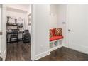 Hallway featuring a charming mudroom nook and a view into an office area at 289 Heritage Se Ln, Atlanta, GA 30316