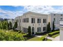 Beautiful two-story home with a well-manicured lawn and classic white brick facade at 316 S Esplanade, Alpharetta, GA 30009