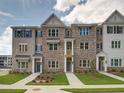 Charming new brick townhomes with manicured lawns in a desirable community at 1976 Deco Dr, Kennesaw, GA 30144