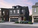 Charming two-story home with gray siding, brick accents, and a front-facing garage at 4011 Chamblee Dunwoody Rd, Chamblee, GA 30341
