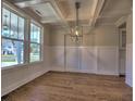 Dining room with hardwood floors, large windows, and coffered ceilings at 3745 Reserve Overlook (#30) Way, Cumming, GA 30041