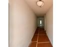 Bright hallway leading into the home showcasing neutral walls and floors ready for finishing at 7252 Eton Ln, Locust Grove, GA 30248