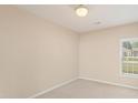 Neutral bedroom with carpeted floors, a ceiling fan and natural light at 310 Autumn Glen Cir, Fayetteville, GA 30215