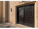 Close up of a unit entrance featuring double front doors and brick facade detail at 5400 Roswell Rd # L-3, Atlanta, GA 30342