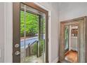 Welcoming entryway featuring a view of the outside and an elegant mirror at 62 High Top Pt, Sandy Springs, GA 30328