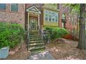 Inviting front entrance featuring stone steps and a glass-paneled door at 62 High Top Pt, Sandy Springs, GA 30328