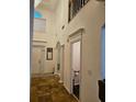 Elegant foyer featuring high ceilings and tile floors, creating a grand entrance at 4299 Sherwood Oaks Dr, Decatur, GA 30034